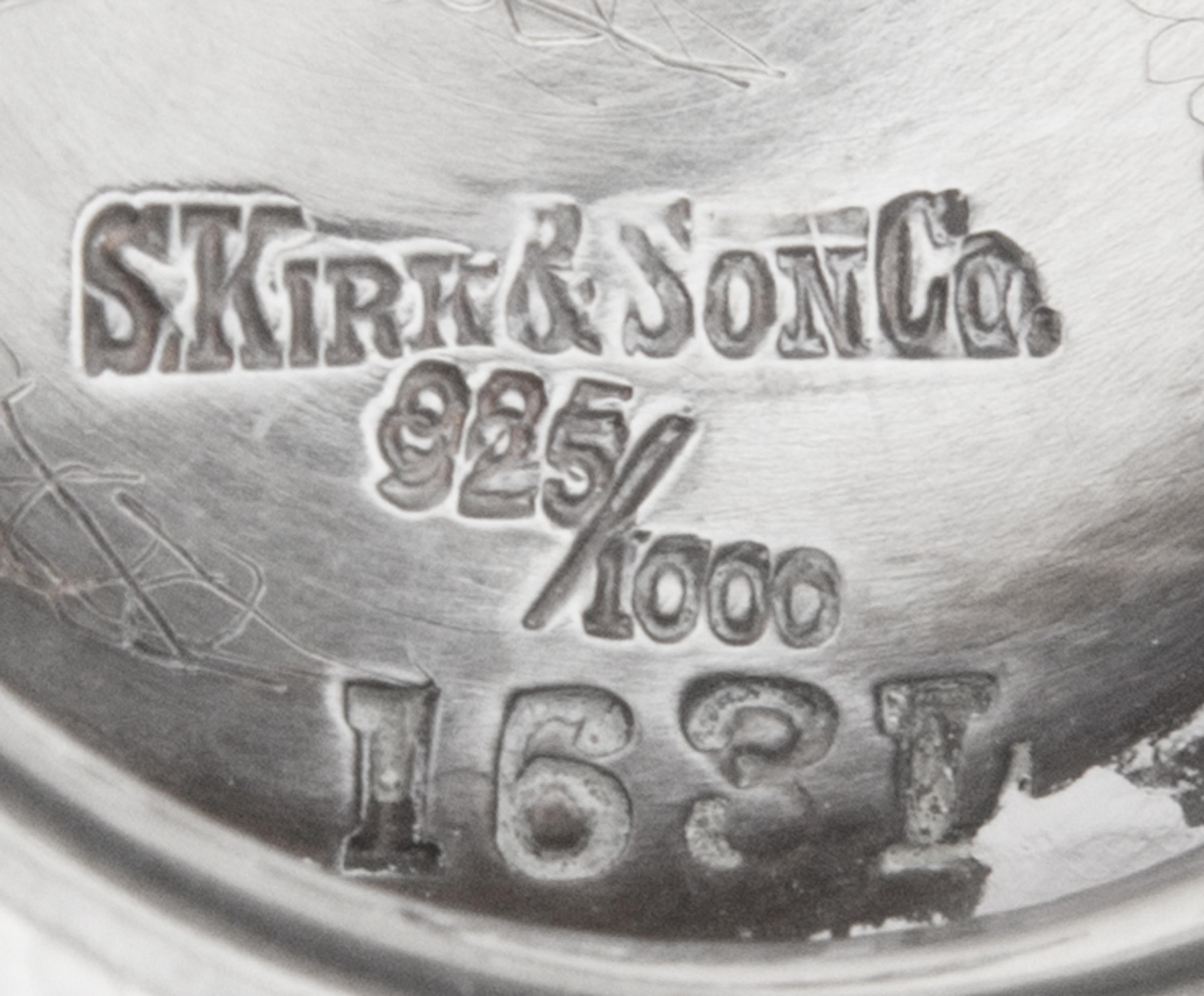 A Pair of American Silver Vases, S. Kirk & Son, Baltimore, MD, each of the bodies decorated with an elaborate garden scene, one depicti