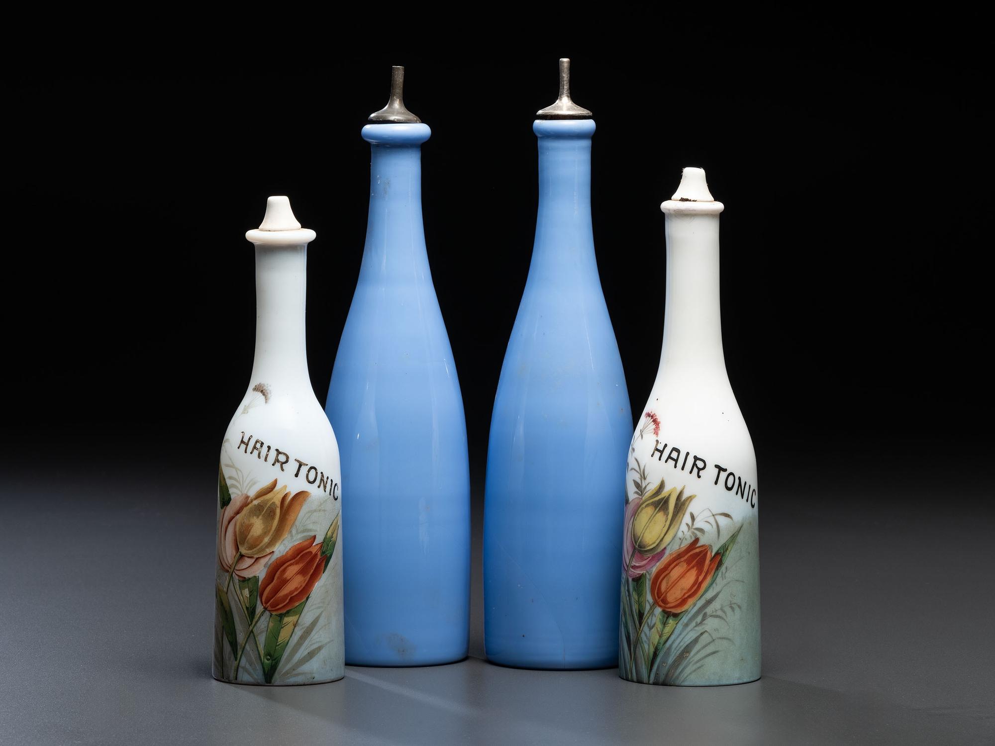 Four Glass Barber Bottles