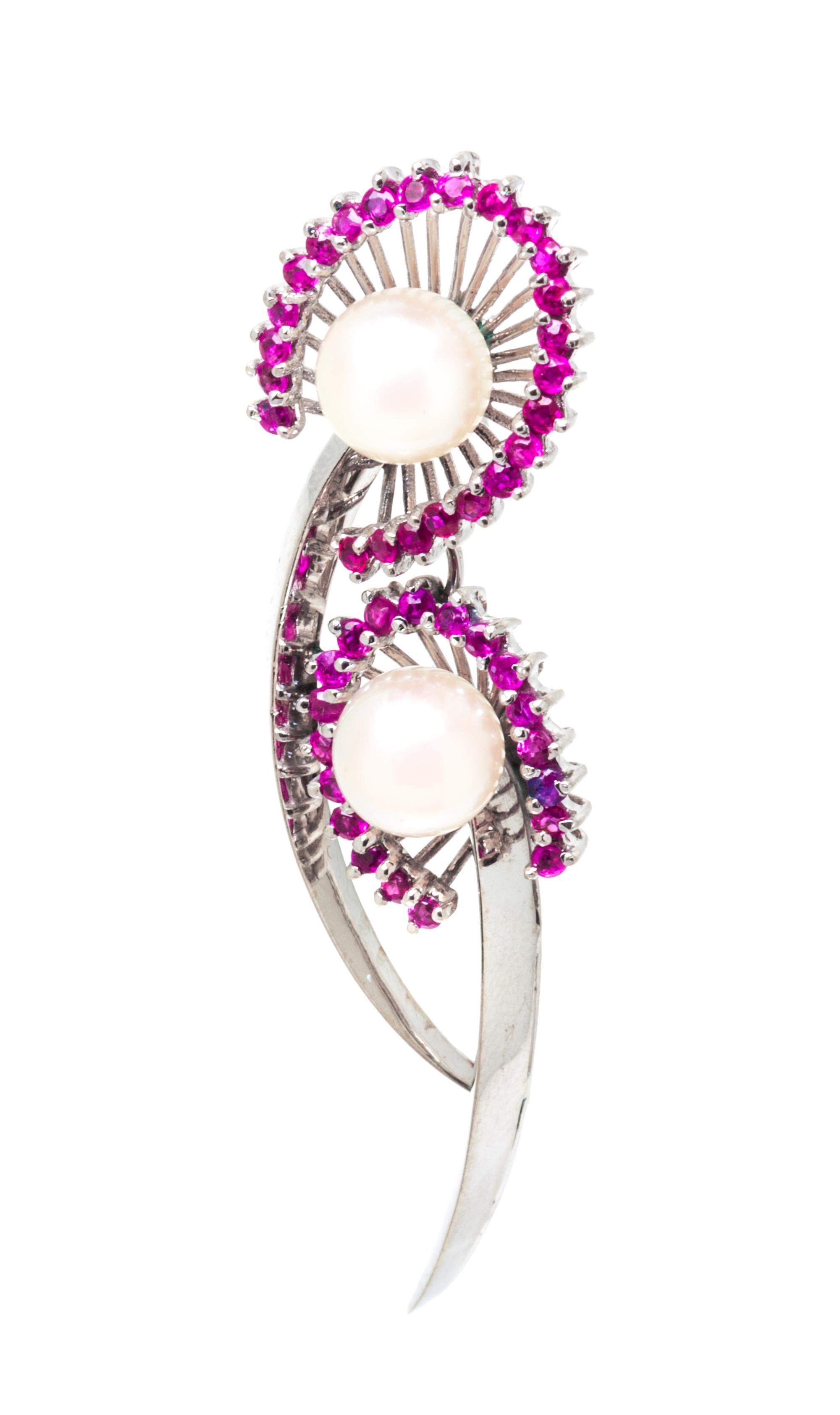 An 18 Karat White Gold, Ruby and Cultured Pearl Brooch, 5.90 dwts.