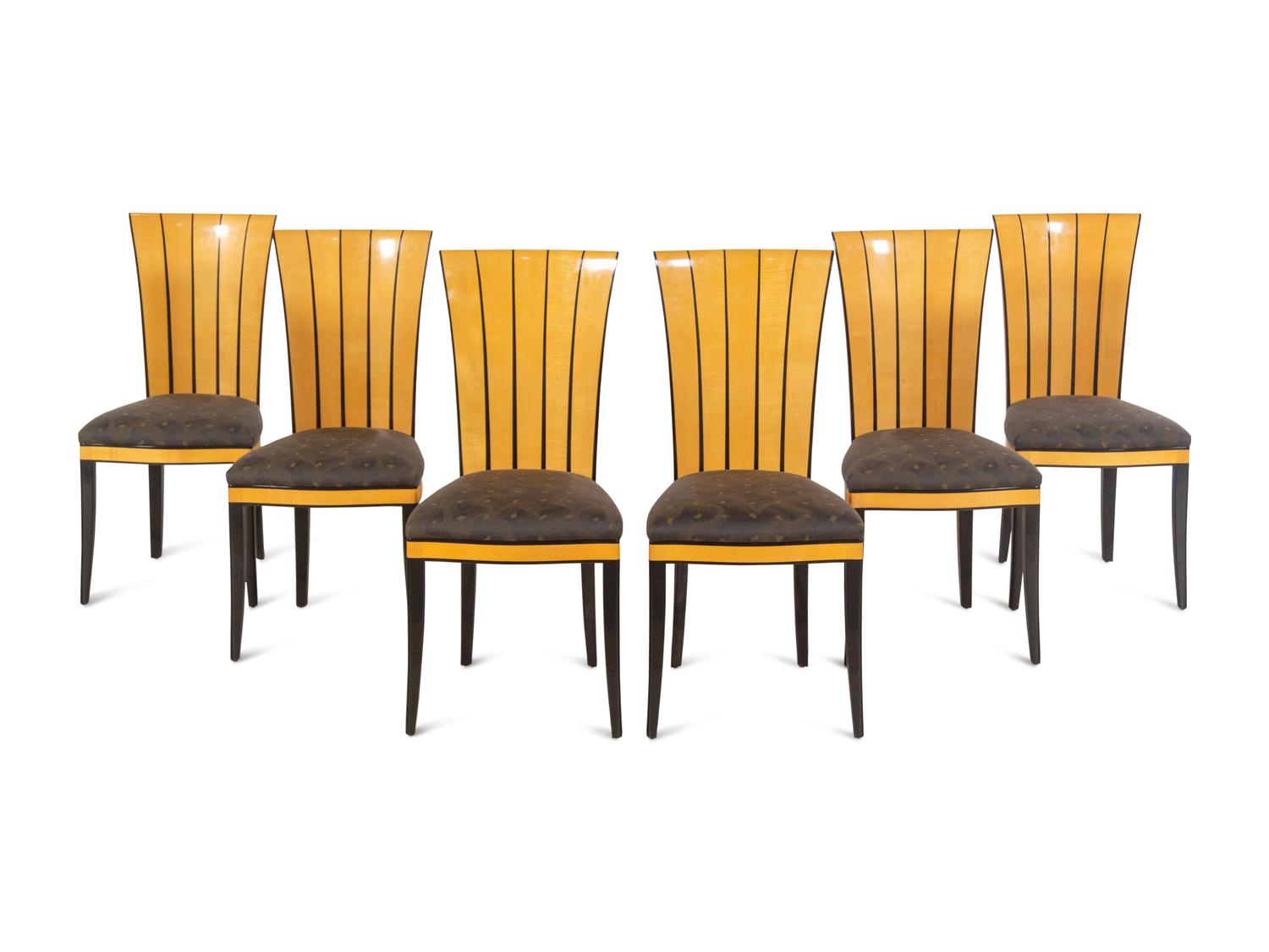 A Part-Ebonized Birch Dining Set