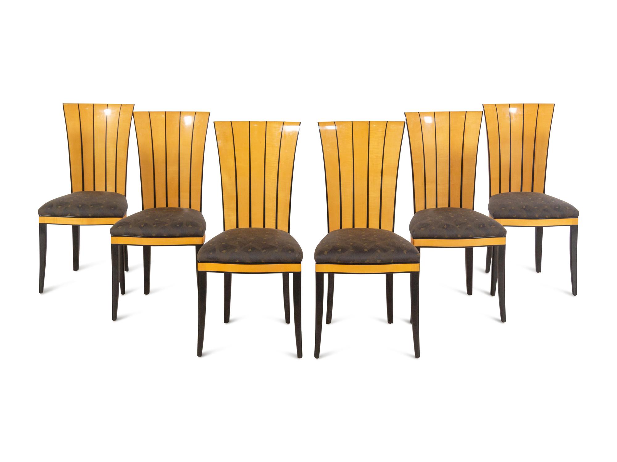 A Part-Ebonized Birch Dining Set