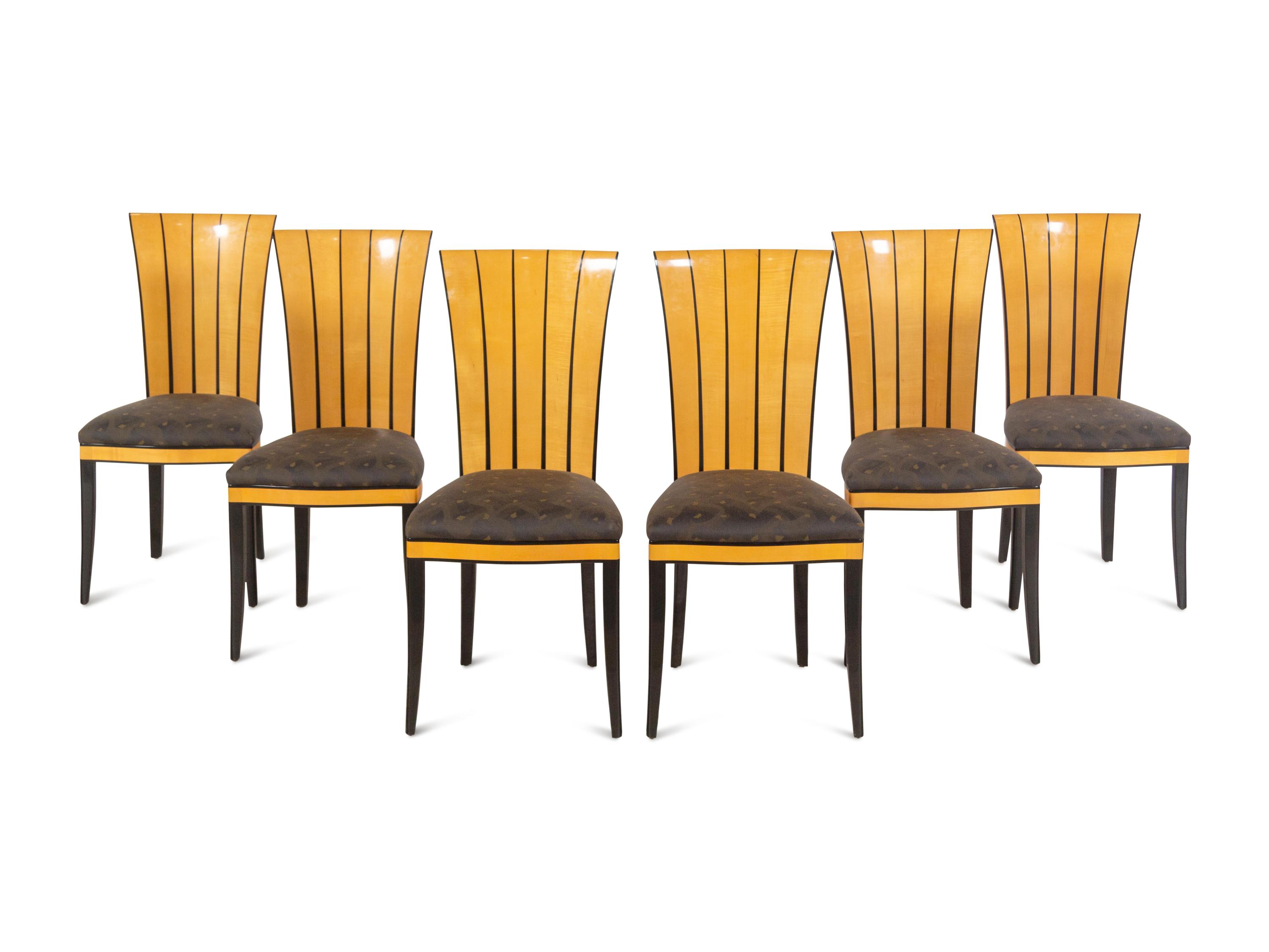 A Part-Ebonized Birch Dining Set