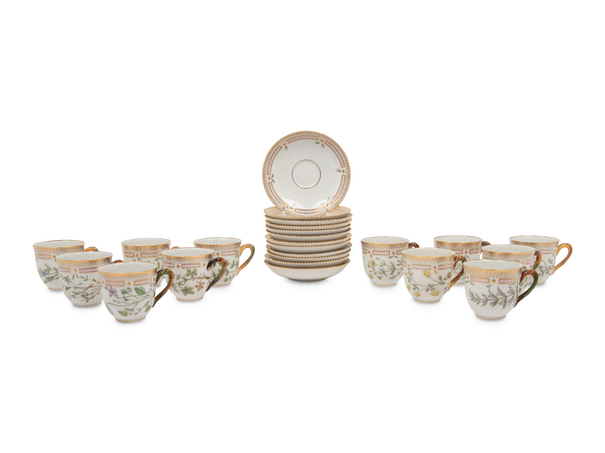 A Set of Twelve Royal Copenhagen Flora Danica Porcelain Teacups and Saucers