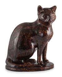A Seated Cat Figure In Rockingham Glaze