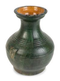 A Chinese Green-Glazed Terracotta Hu-Form Vase — HAN DYNASTY