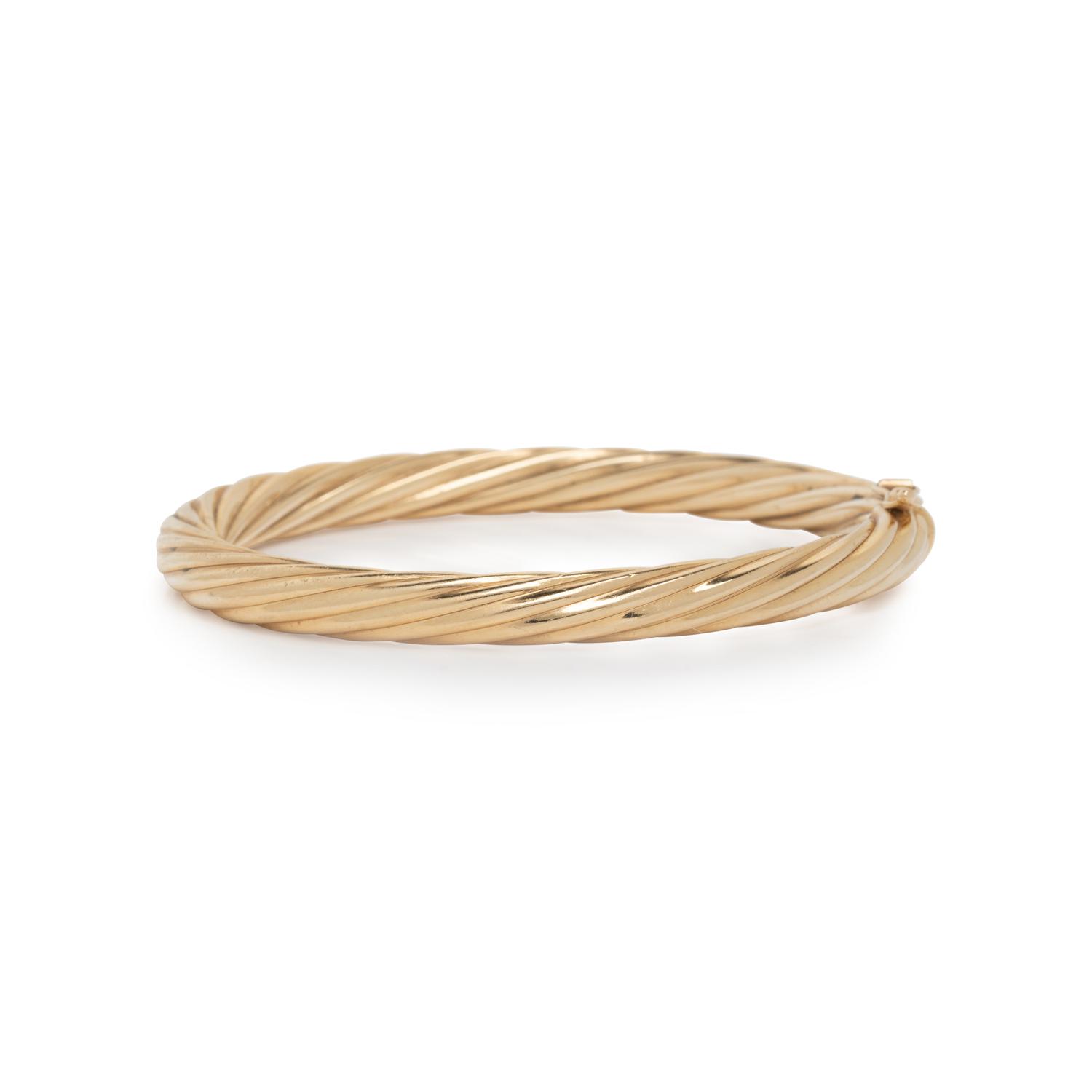 TIFFANY & CO., YELLOW GOLD TWIST BANGLE BRACELET