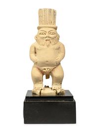 An Egyptian Painted Limestone Bes