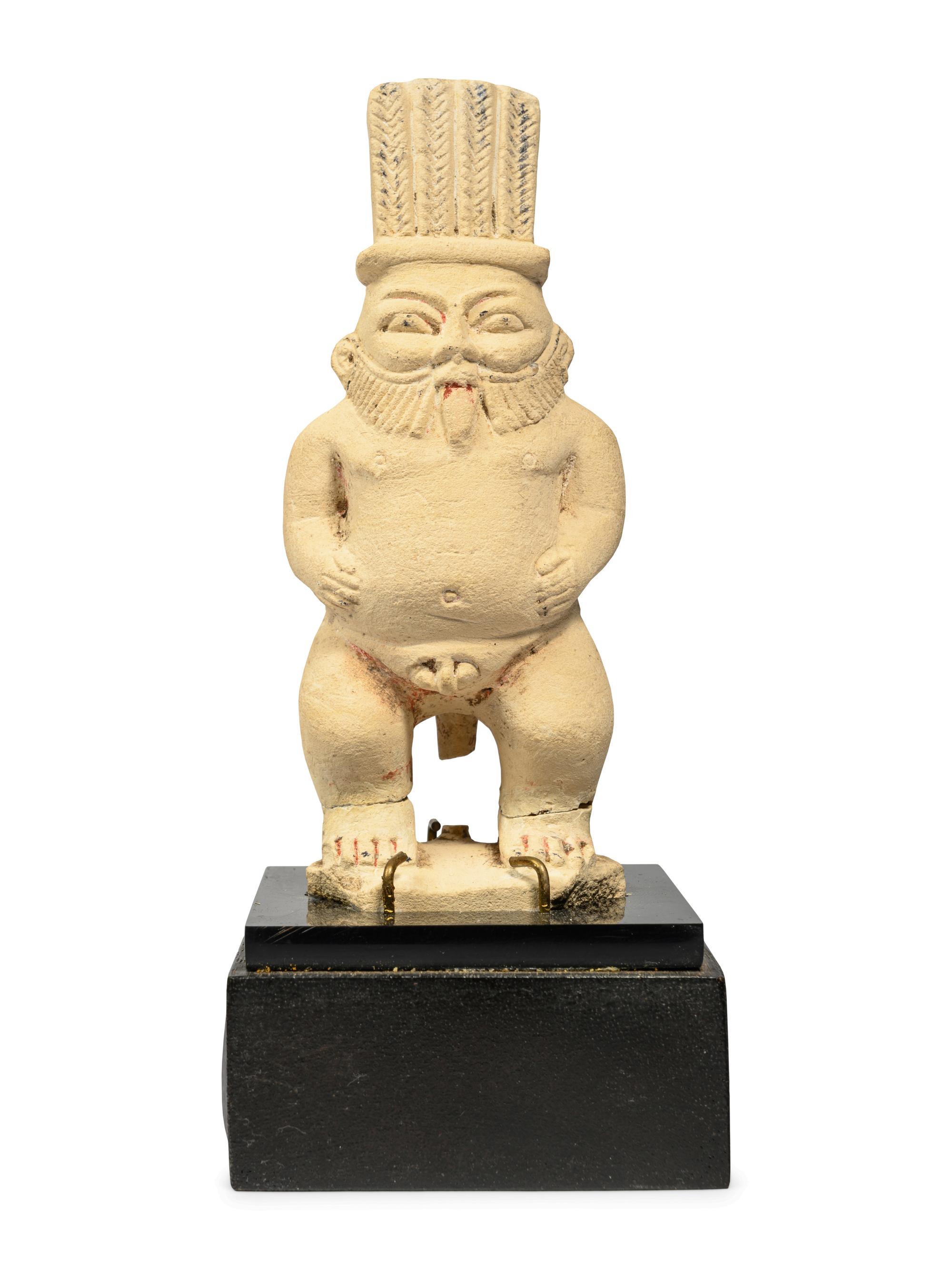 An Egyptian Painted Limestone Bes