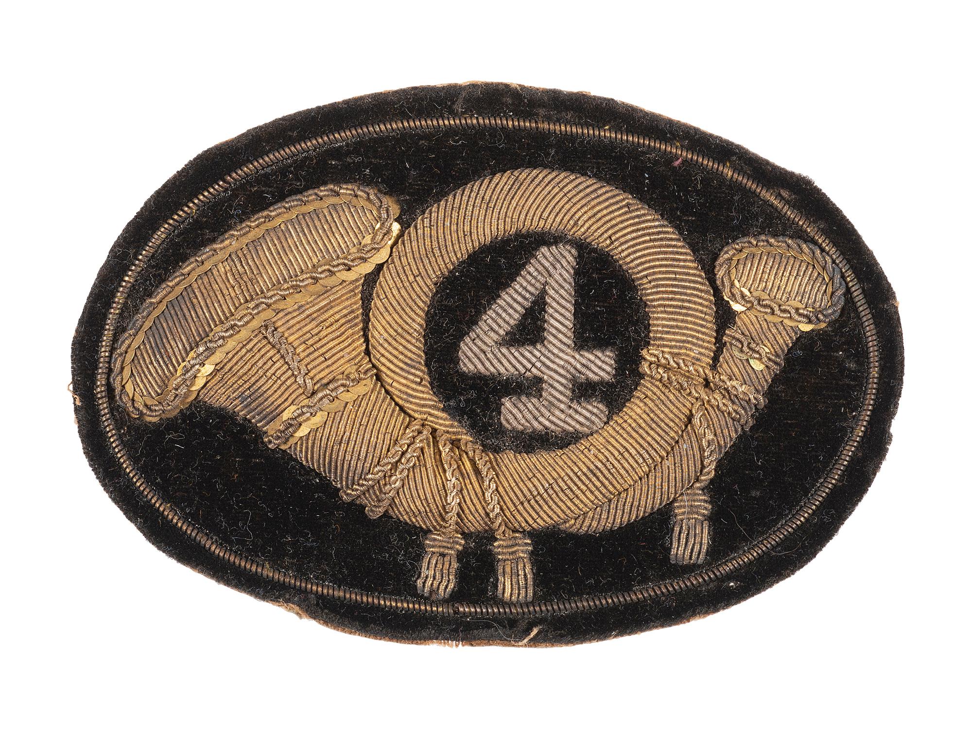 Civil War infantry officer's hat insignia with regimental number "4."