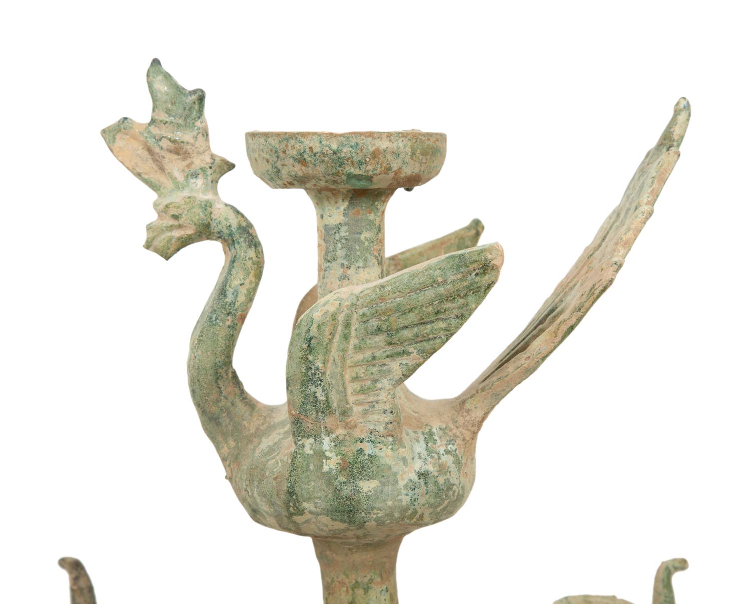 A Han Pottery Phoenix Oil Lamp
