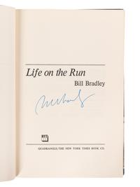 A Group of Nine Books on Basketball Including Signed Autograph Editions
