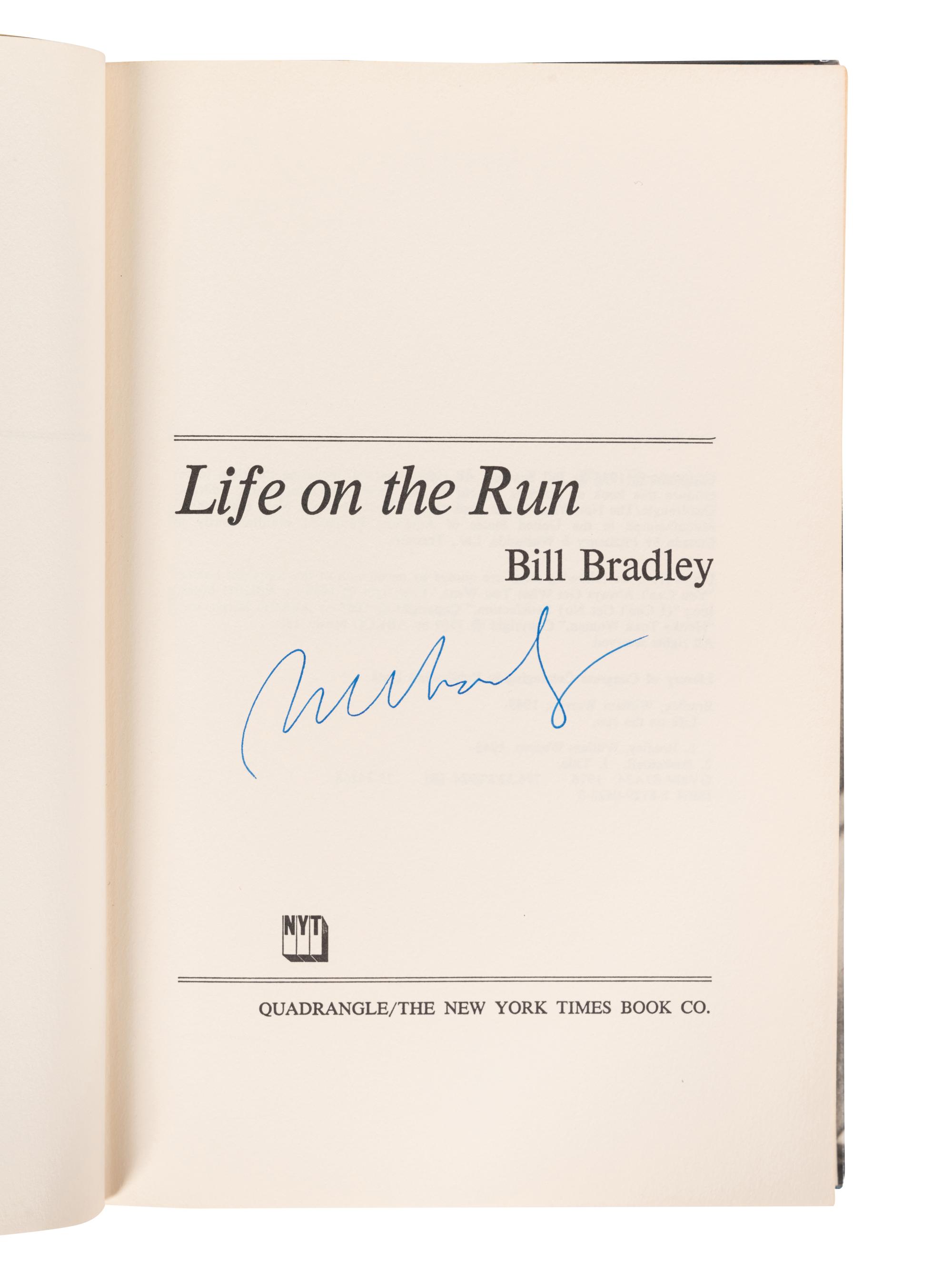 A Group of Nine Books on Basketball Including Signed Autograph Editions