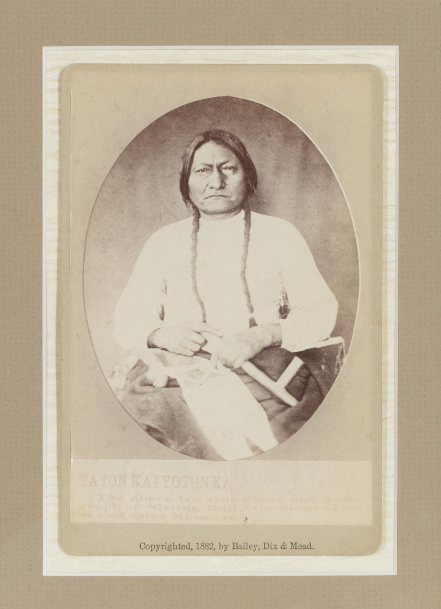 [Native Americana]. A pair of Sitting Bull cabinet photographs. Fort Randall, Dakota Territory: Bailey, Dix & Mead, 1882.