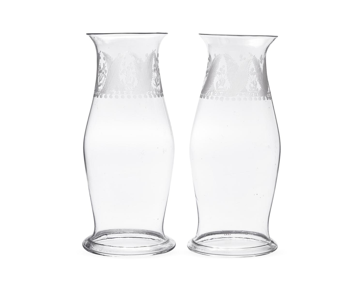 A Pair Of Cut And Etched Uncolored Glass Hurricane Globes
