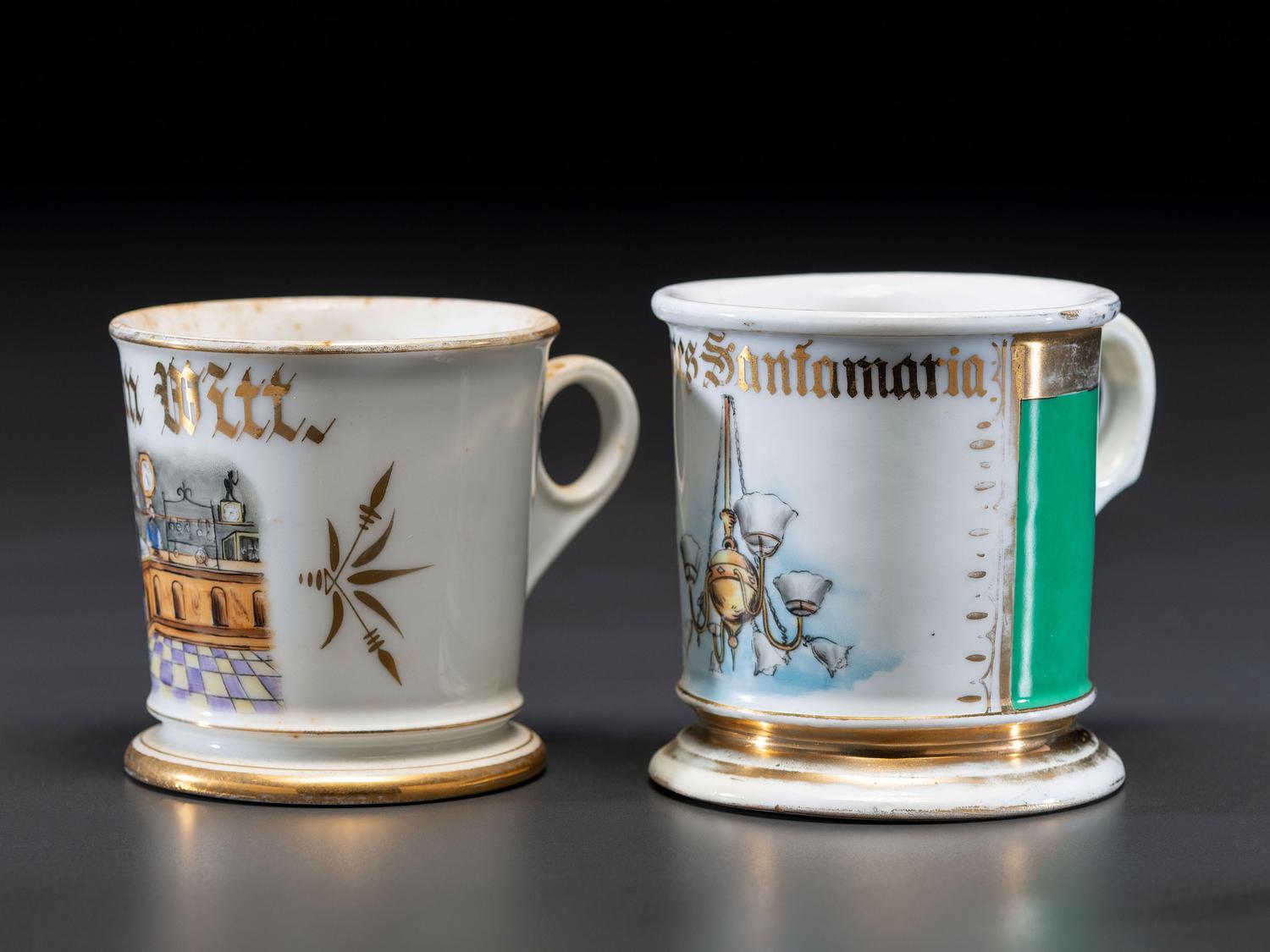 Two Retailer's Porcelain Occupational Shaving Mugs