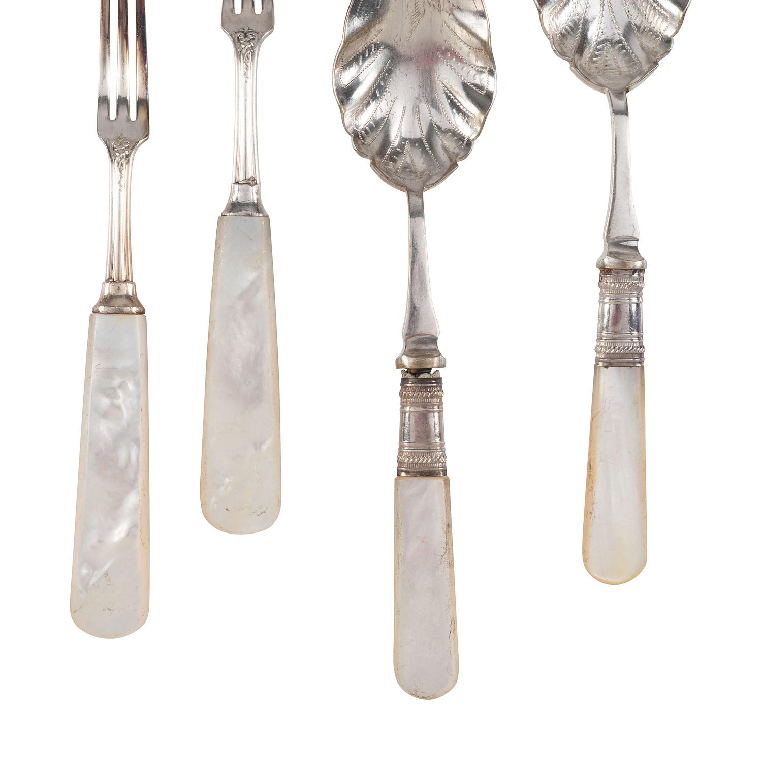 Twenty Silver Serving Utensils