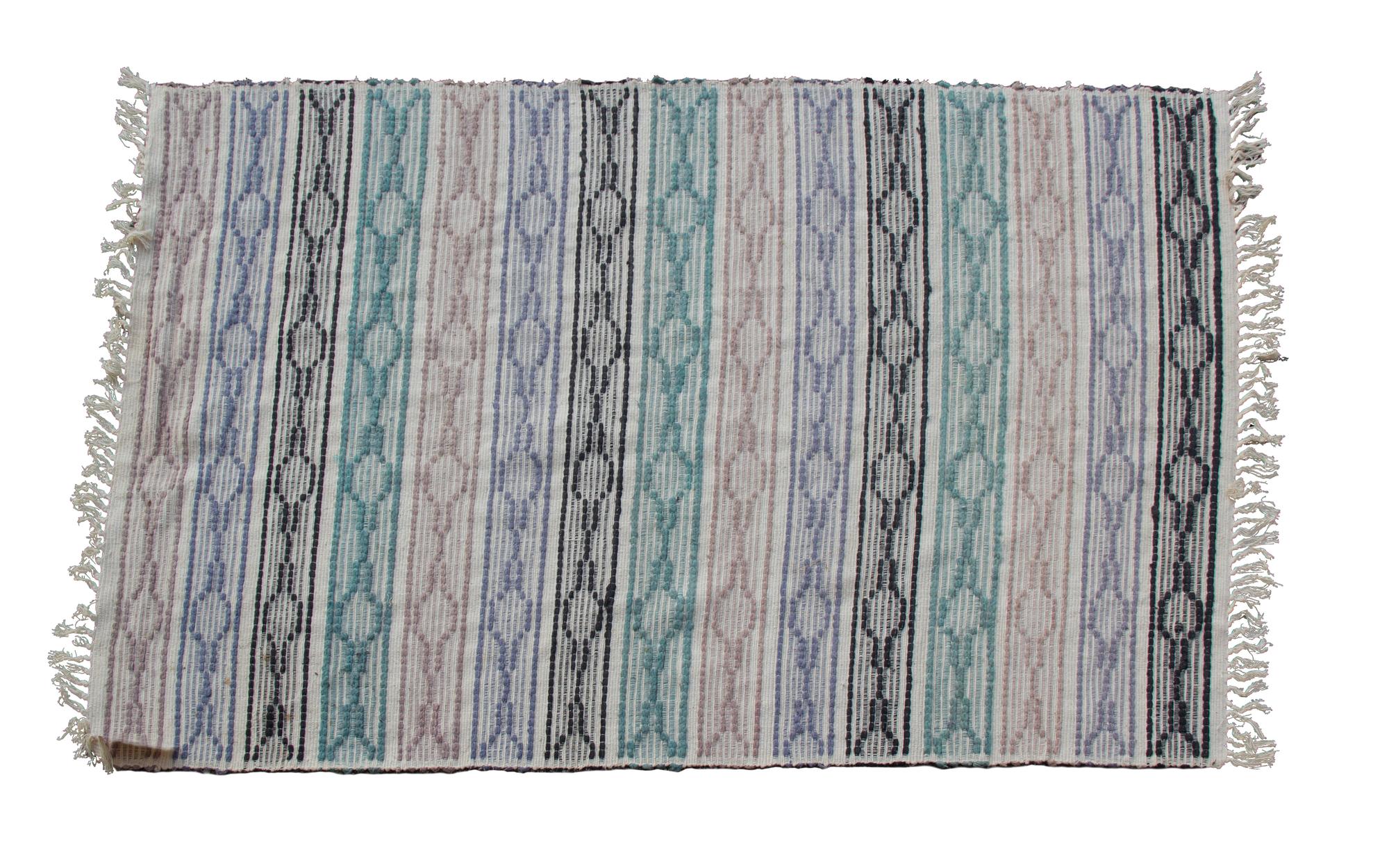 A Rug 6 feet 1 inch x 4 feet 2 inches.