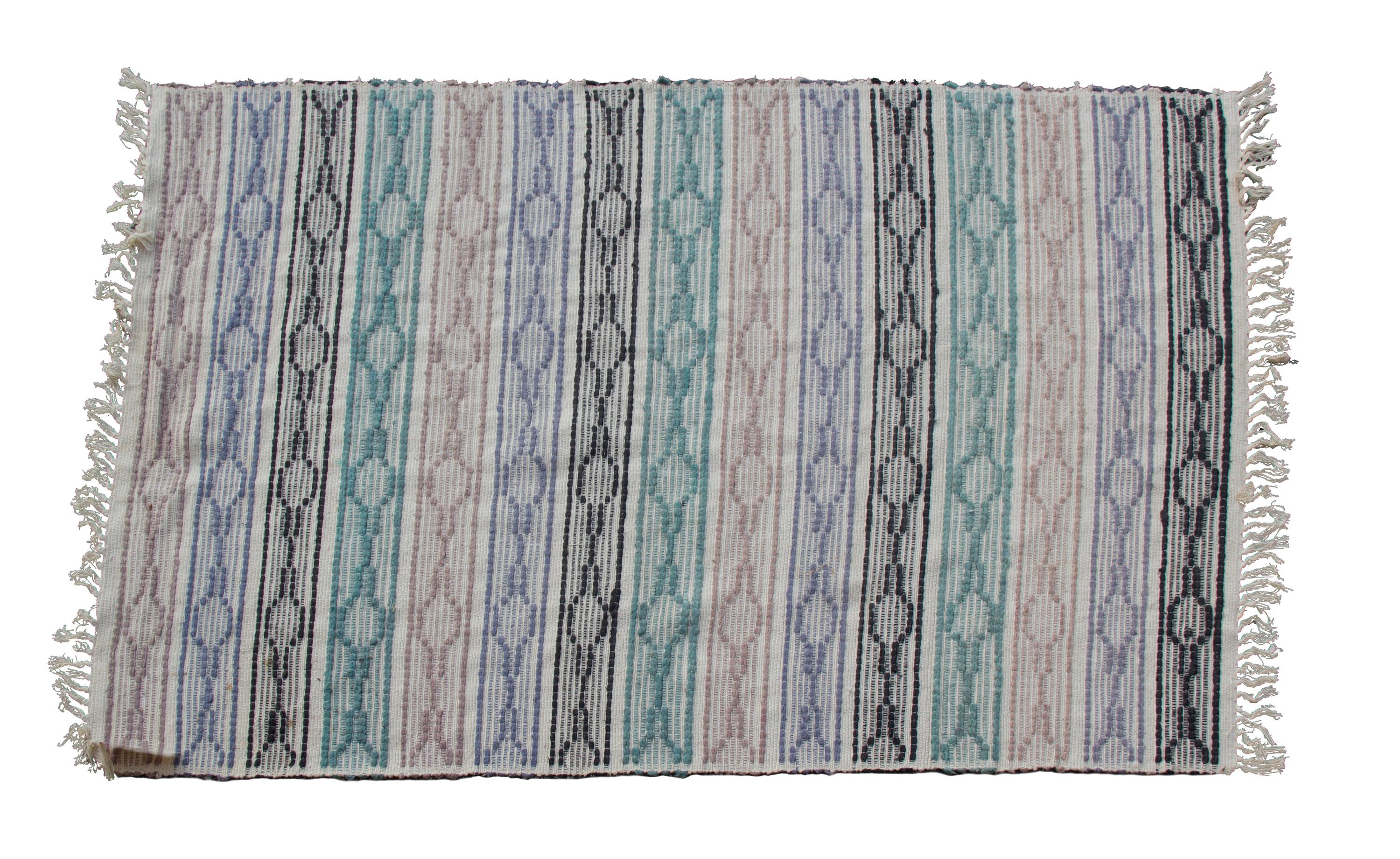 A Rug 6 feet 1 inch x 4 feet 2 inches.