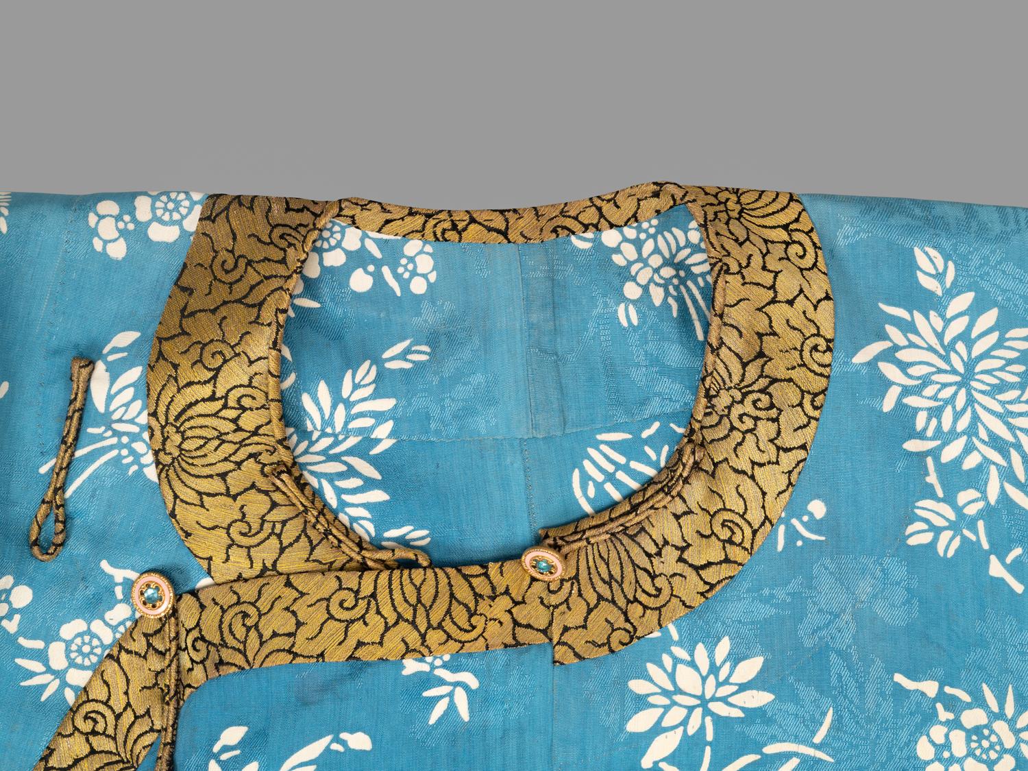 A Chinese Blue Ground Woven Silk Lady's Robe
