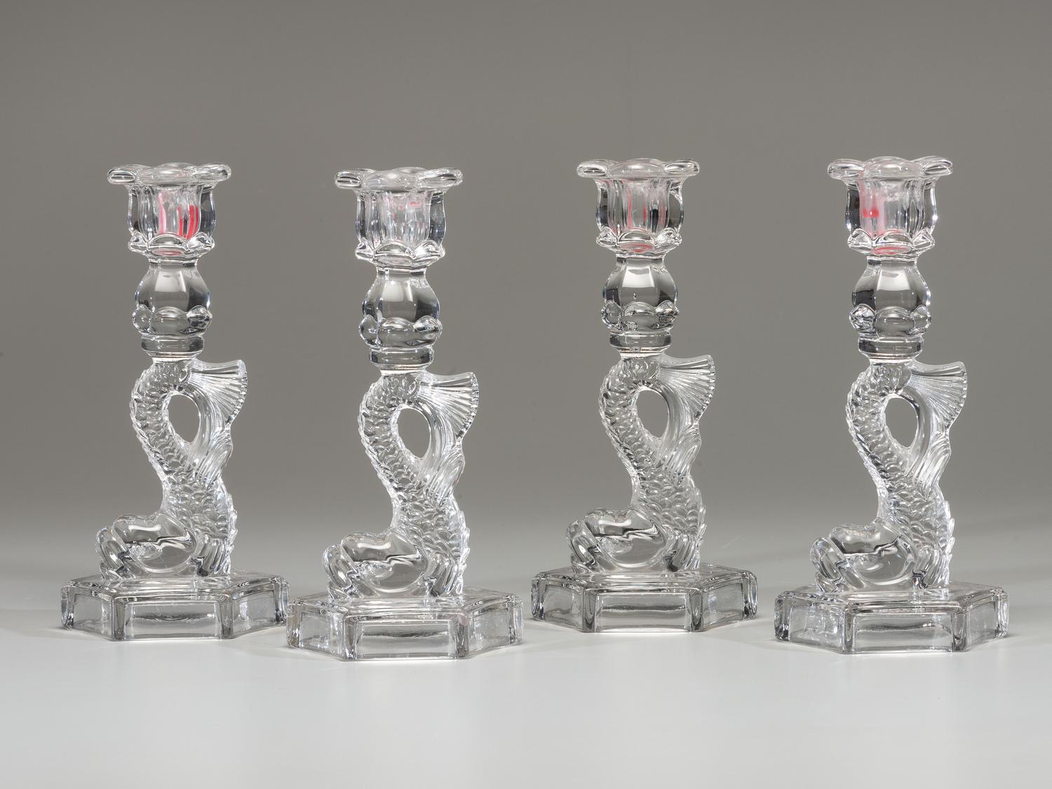 Four Molded Glass Dolphin Candlesticks