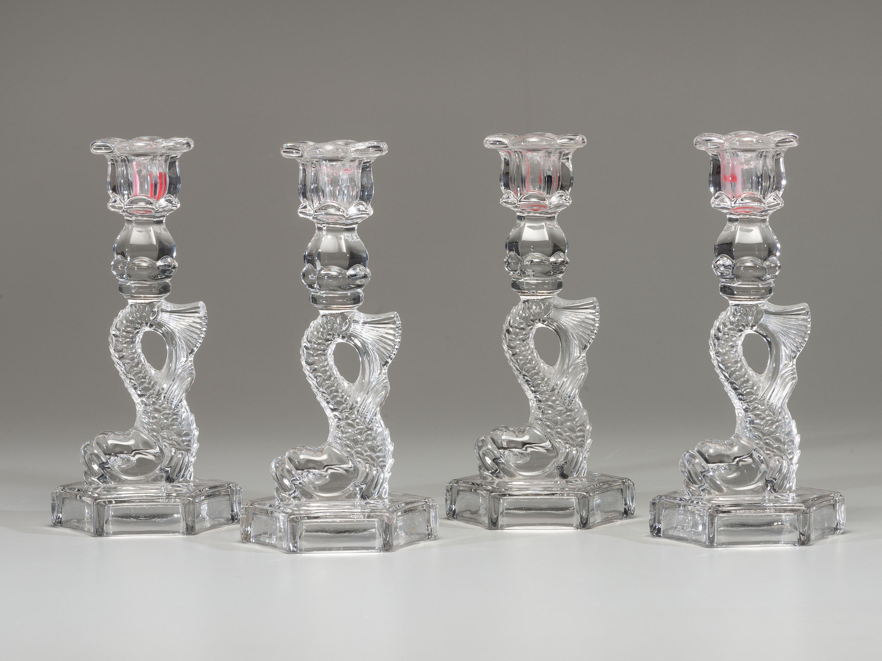 Four Molded Glass Dolphin Candlesticks