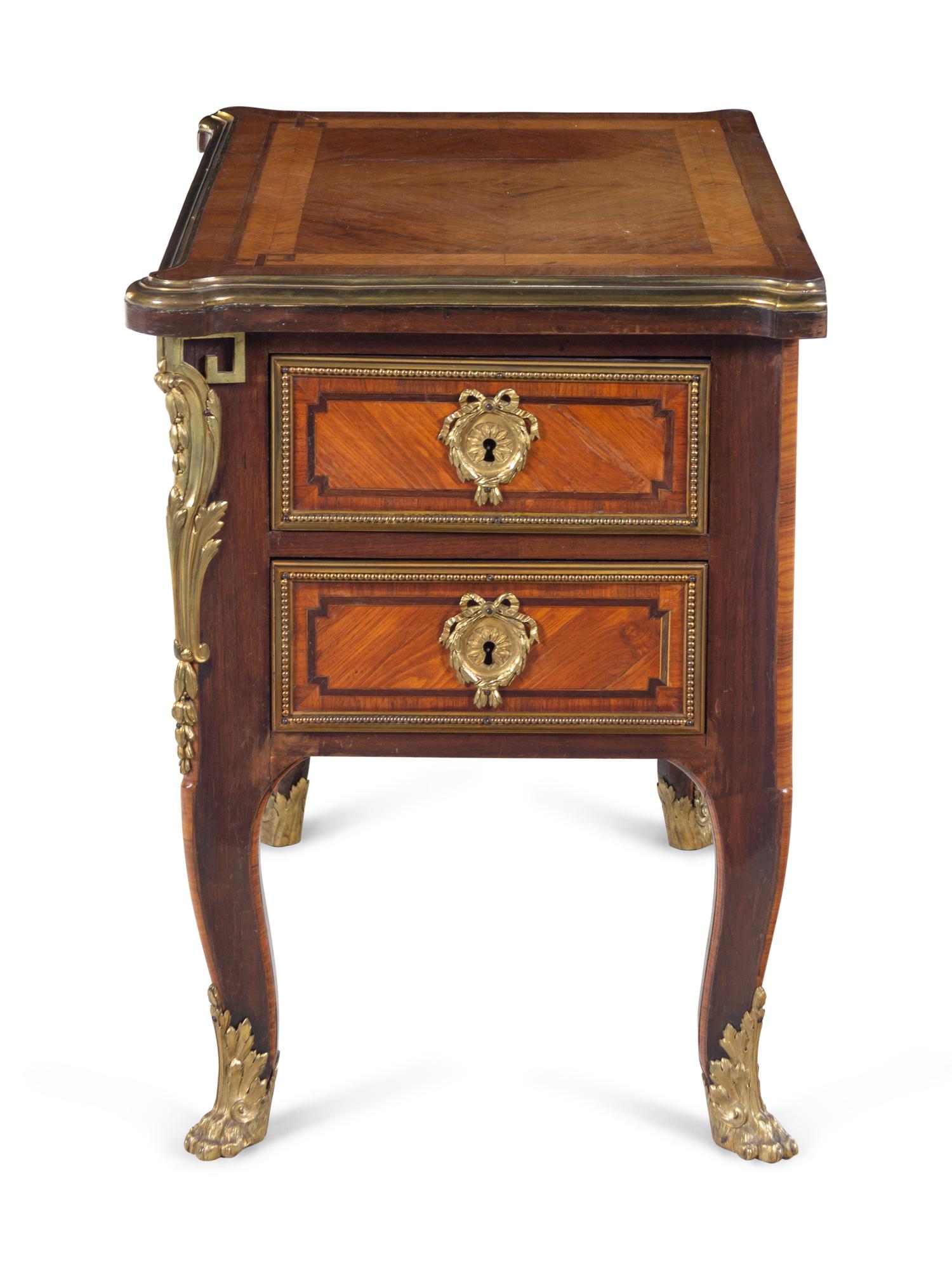A Louis XV Style Gilt Bronze Mounted Kingwood Cabinet
