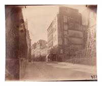 A group of four photographs depicting Paris ( Moulin Rouge [86 boulevard de Clichy] ; Passage Moret, ruelle des Gobelins ; Rue des Prêtres Saint-Séverin, au fond rue Boutebrie; Rue des Gobelins)