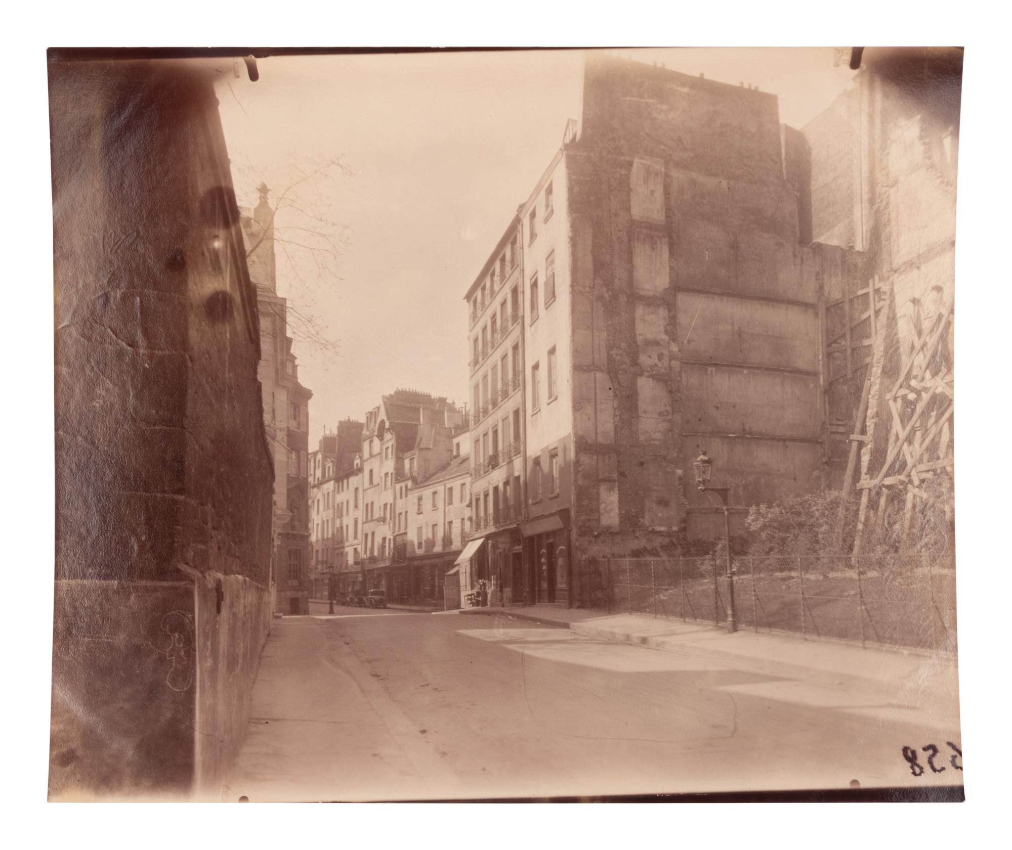 A group of four photographs depicting Paris ( Moulin Rouge [86 boulevard de Clichy] ; Passage Moret, ruelle des Gobelins ; Rue des Prêtres Saint-Séverin, au fond rue Boutebrie; Rue des Gobelins)