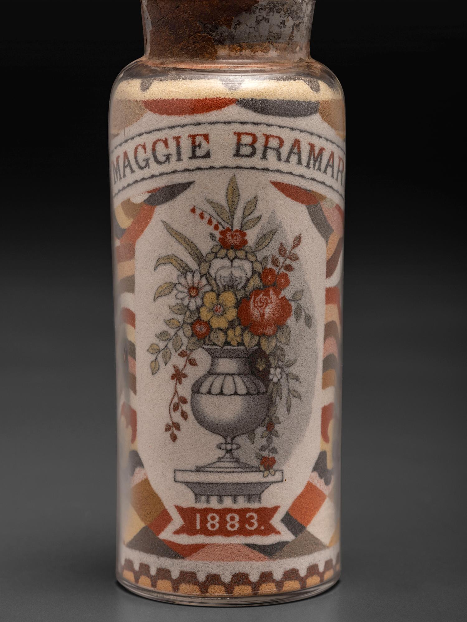 A Pair of Andrew Clemens (American, 1857-1894) 'Sweetheart' Sand Bottles