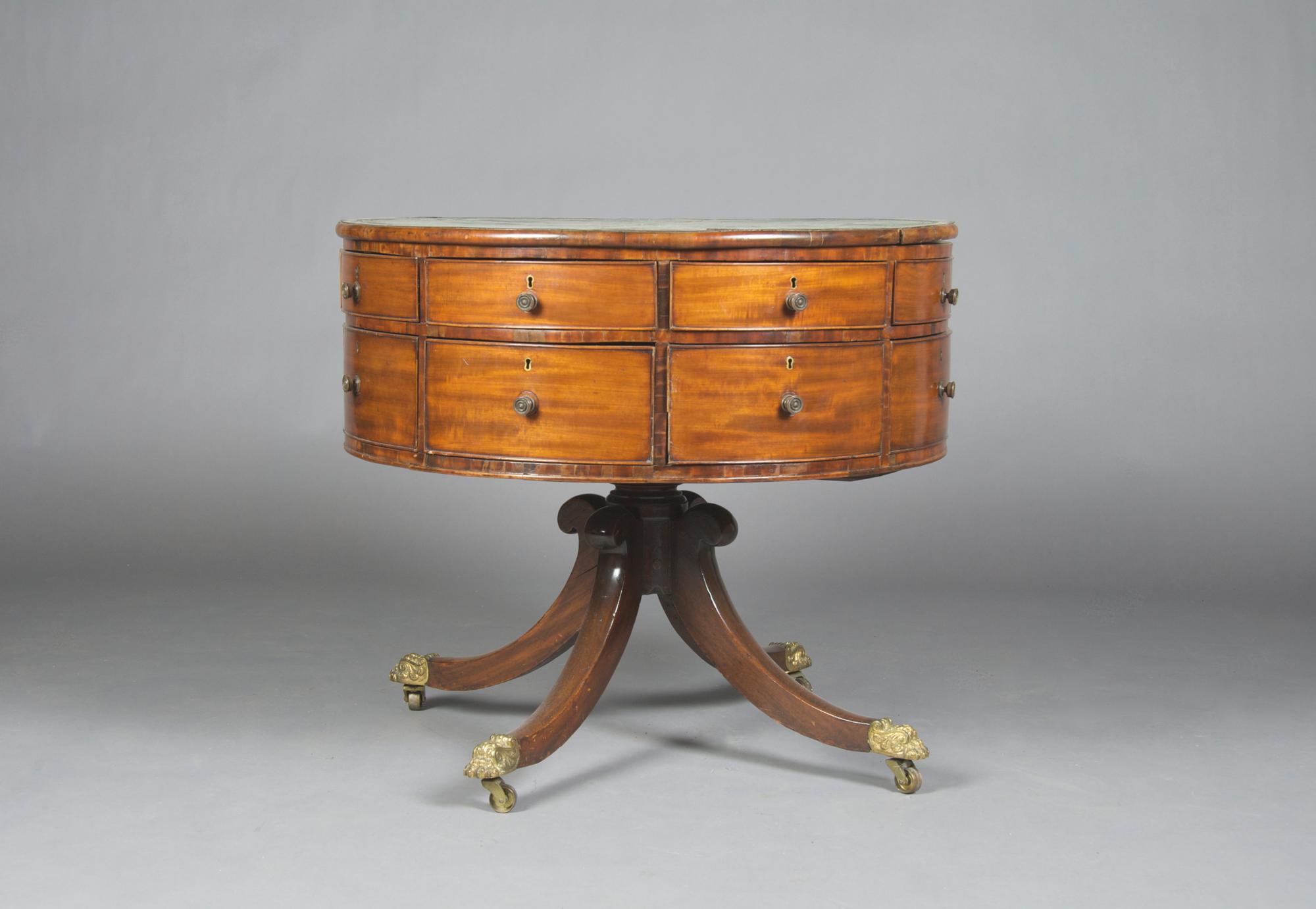 A George III Mahogany Library Table, Height 25 1/4 x diameter 29 1/2 inches.