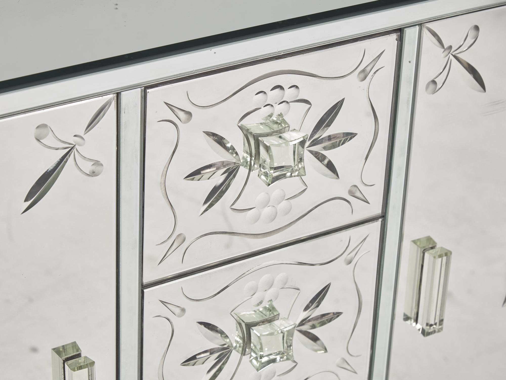 An Art Deco Etched Glass and Ebonized Mirrored Sideboard