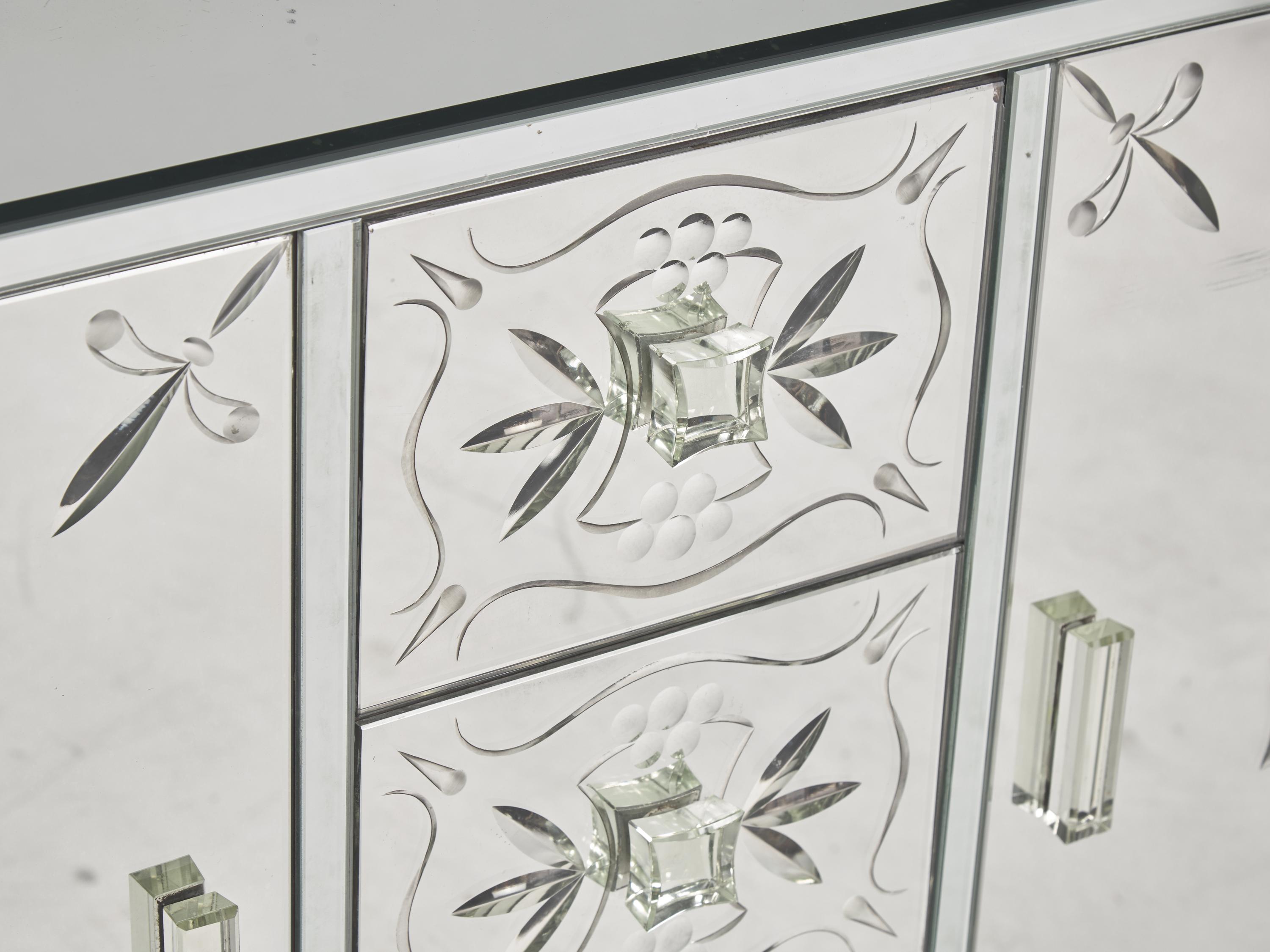 An Art Deco Etched Glass and Ebonized Mirrored Sideboard