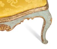An Italian Rococo Painted and Parcel Gilt Open Armchair