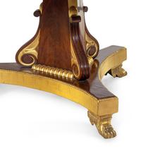A Regency Parcel Gilt Mahogany Center Table