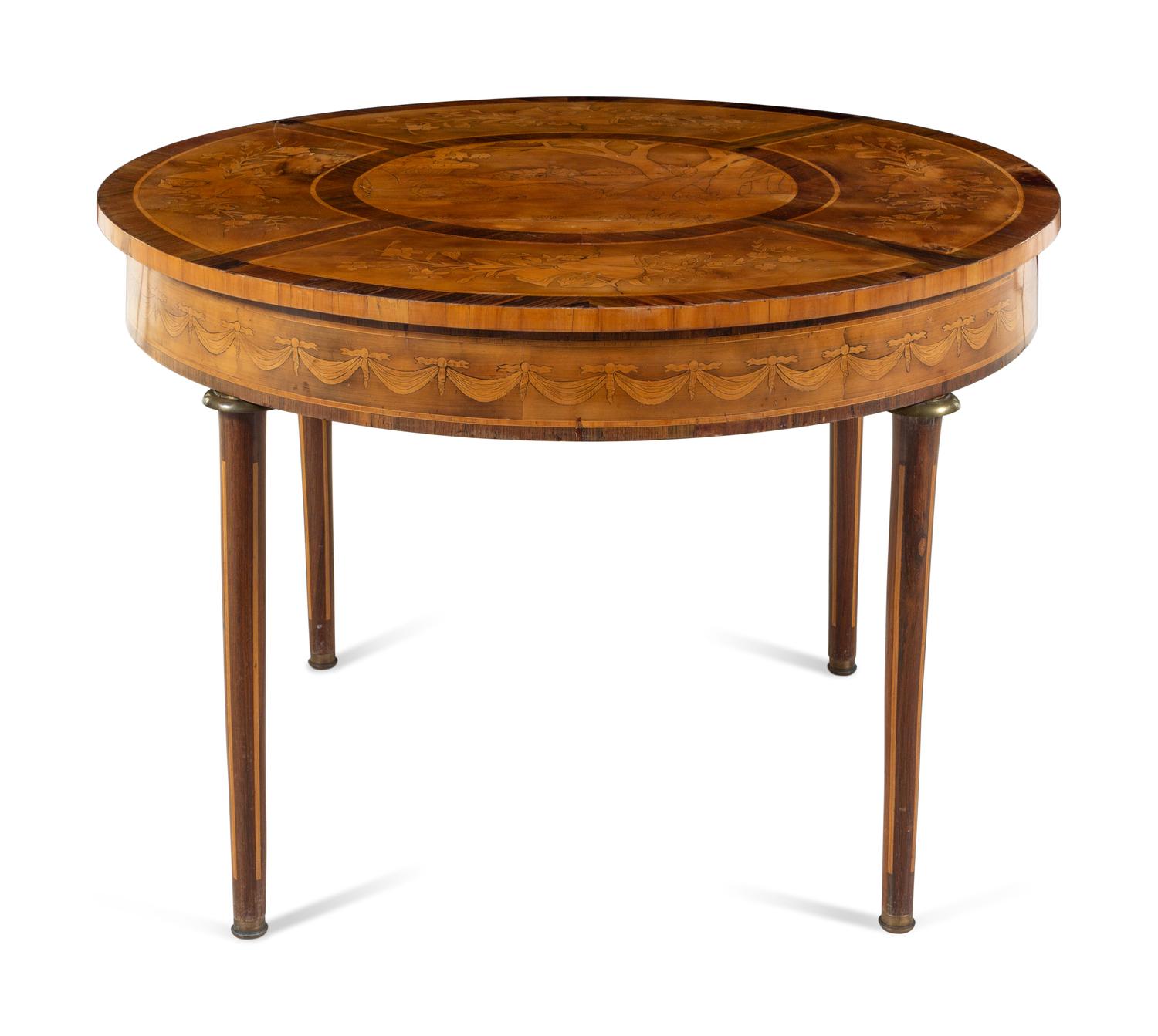 A Louis XVI Style Marquetry Center Table