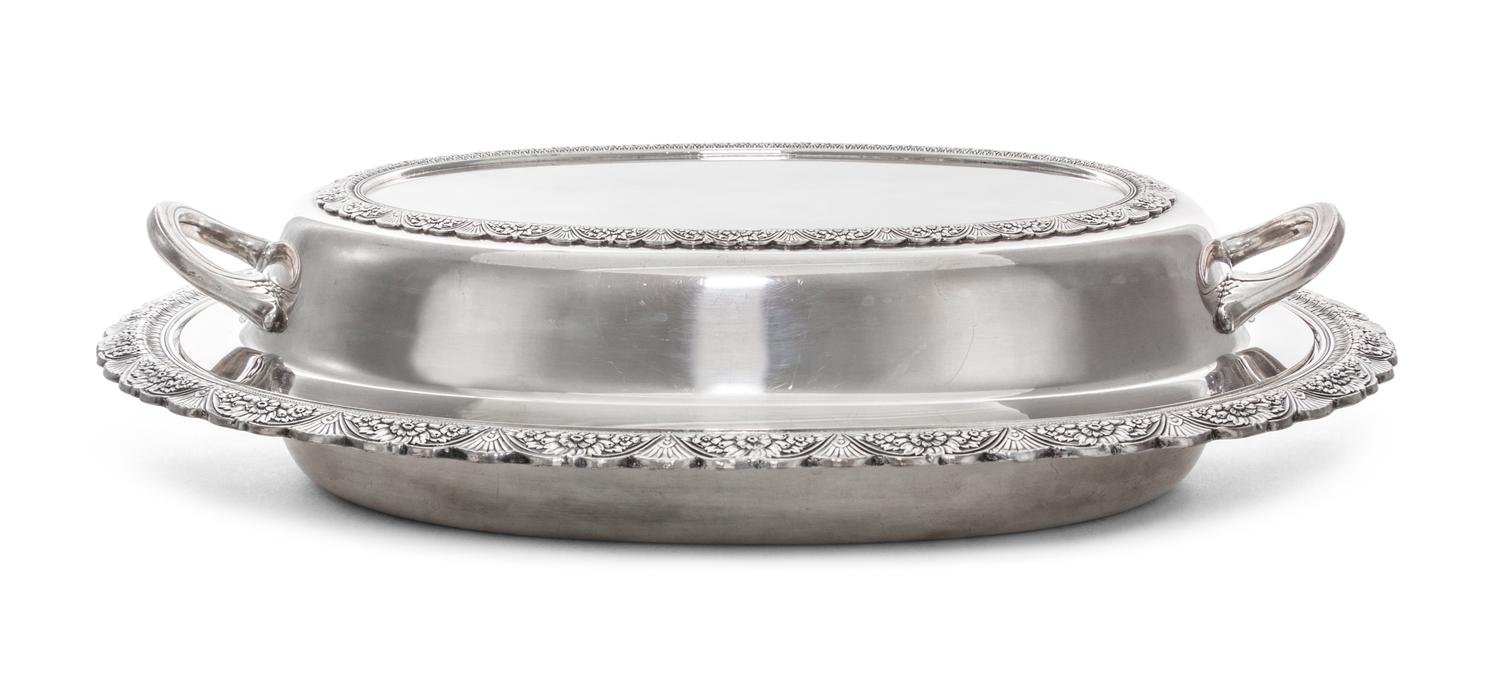 An American Silver-Plate Covered Entree Dish,, Roger Bros., 20th Century, of oval, handled form with cast foliate decoration.