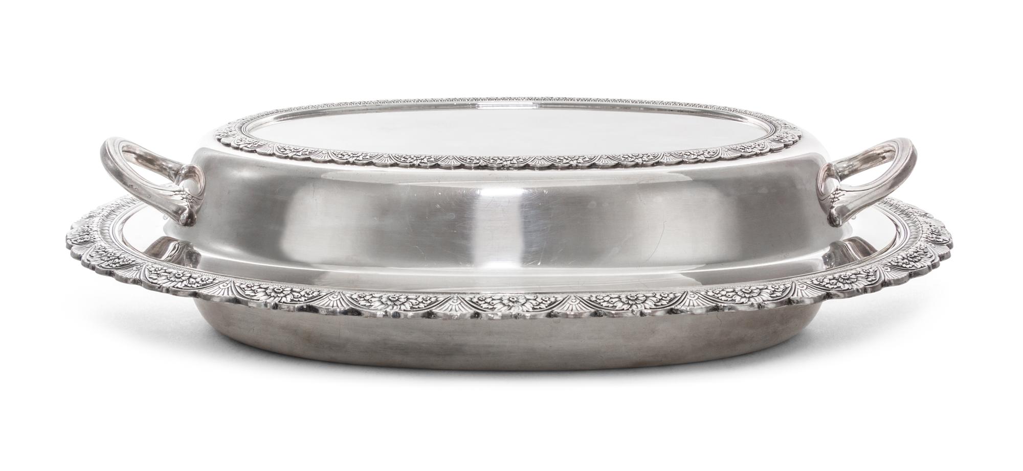 An American Silver-Plate Covered Entree Dish,, Roger Bros., 20th Century, of oval, handled form with cast foliate decoration.