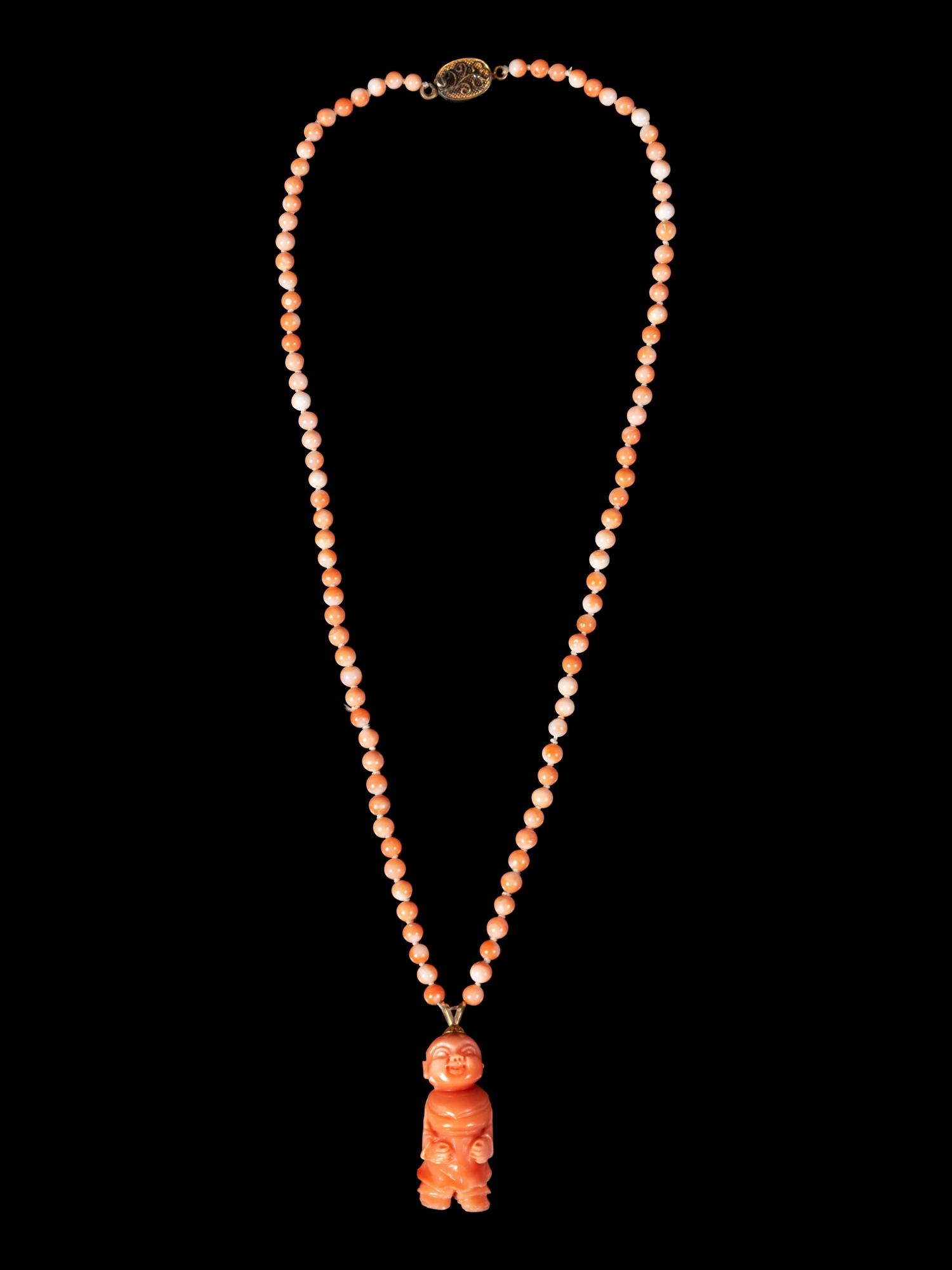 A Chinese Pink Coral Necklace
