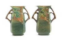 A Pair of Roseville Bushberry Pottery Vases Height 8 1/4 inches.