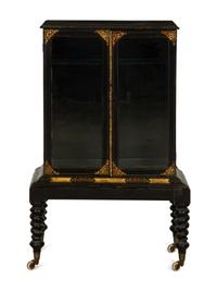 A Victorian Black and Gilt Lacquer Etagère on Stand