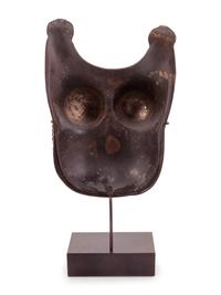 A Bronze Model of a Bhuta Ceremonial Body Mask