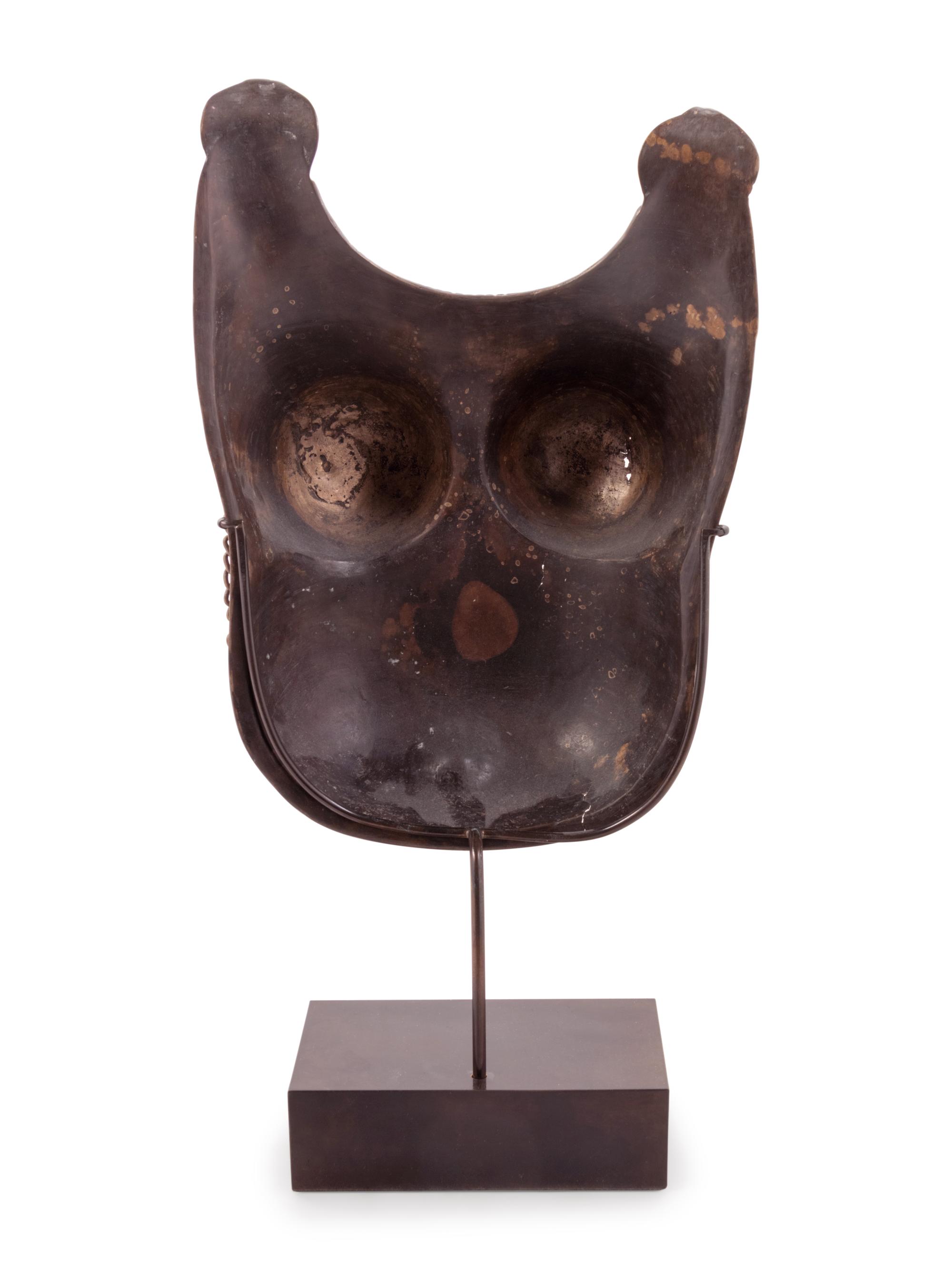 A Bronze Model of a Bhuta Ceremonial Body Mask