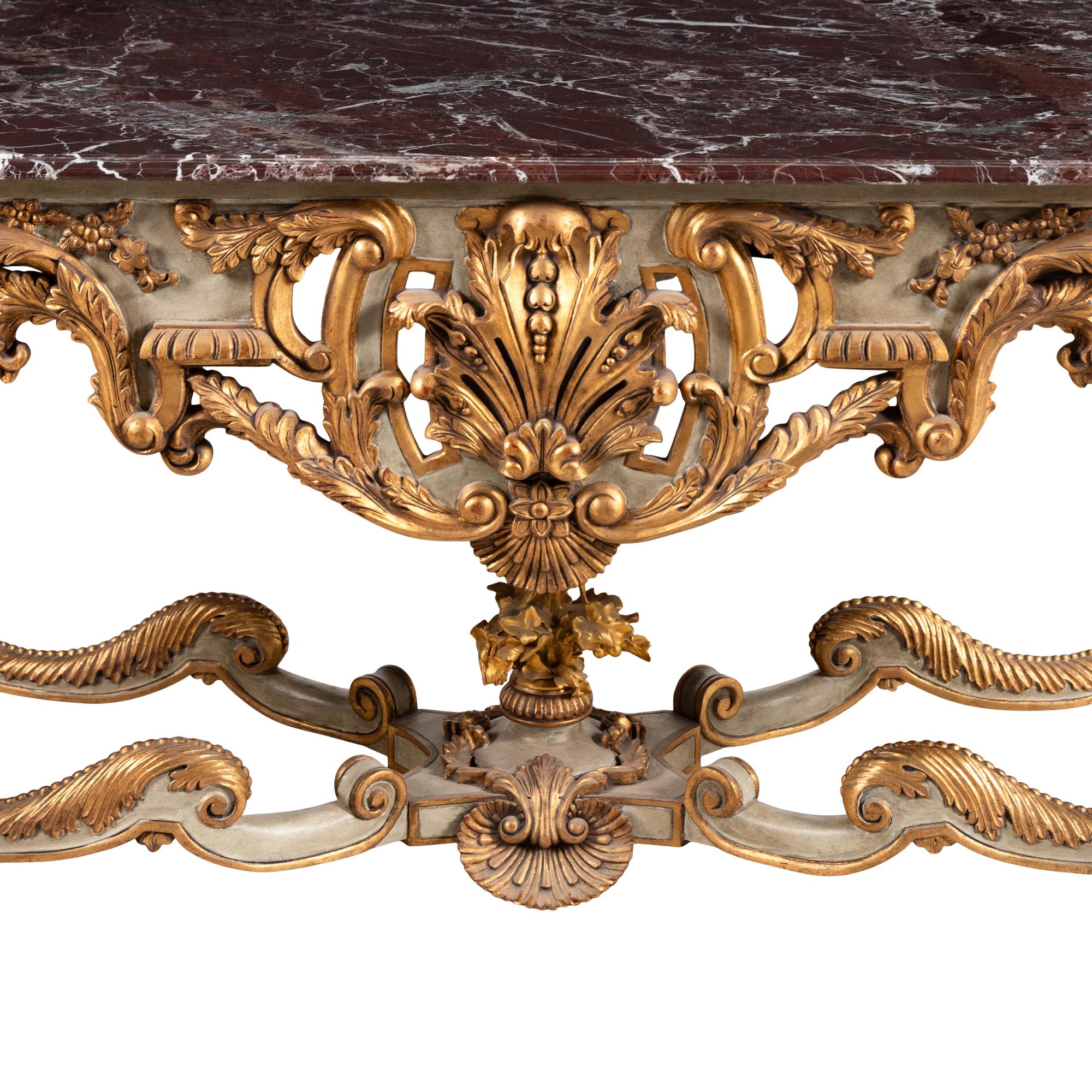 A Régence Style Painted and Parcel Gilt Marble-Top Center Table