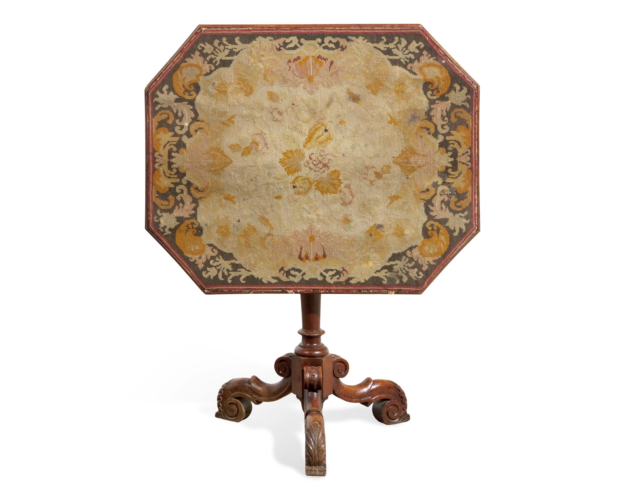 A Victorian Baroque Revival Tilt-Top Table with Needlework Top