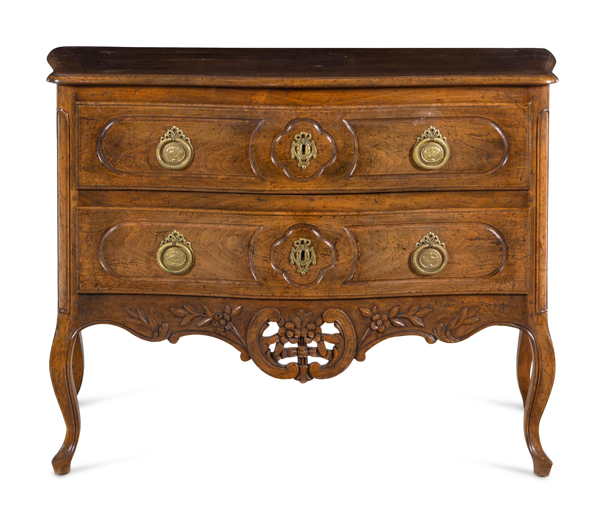 A Louis XV Style Walnut Commode