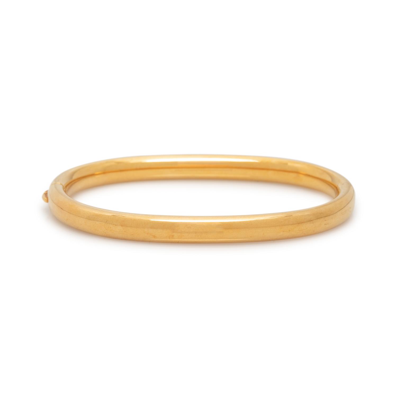 SCHLUGER, YELLOW GOLD BANGLE BRACELET