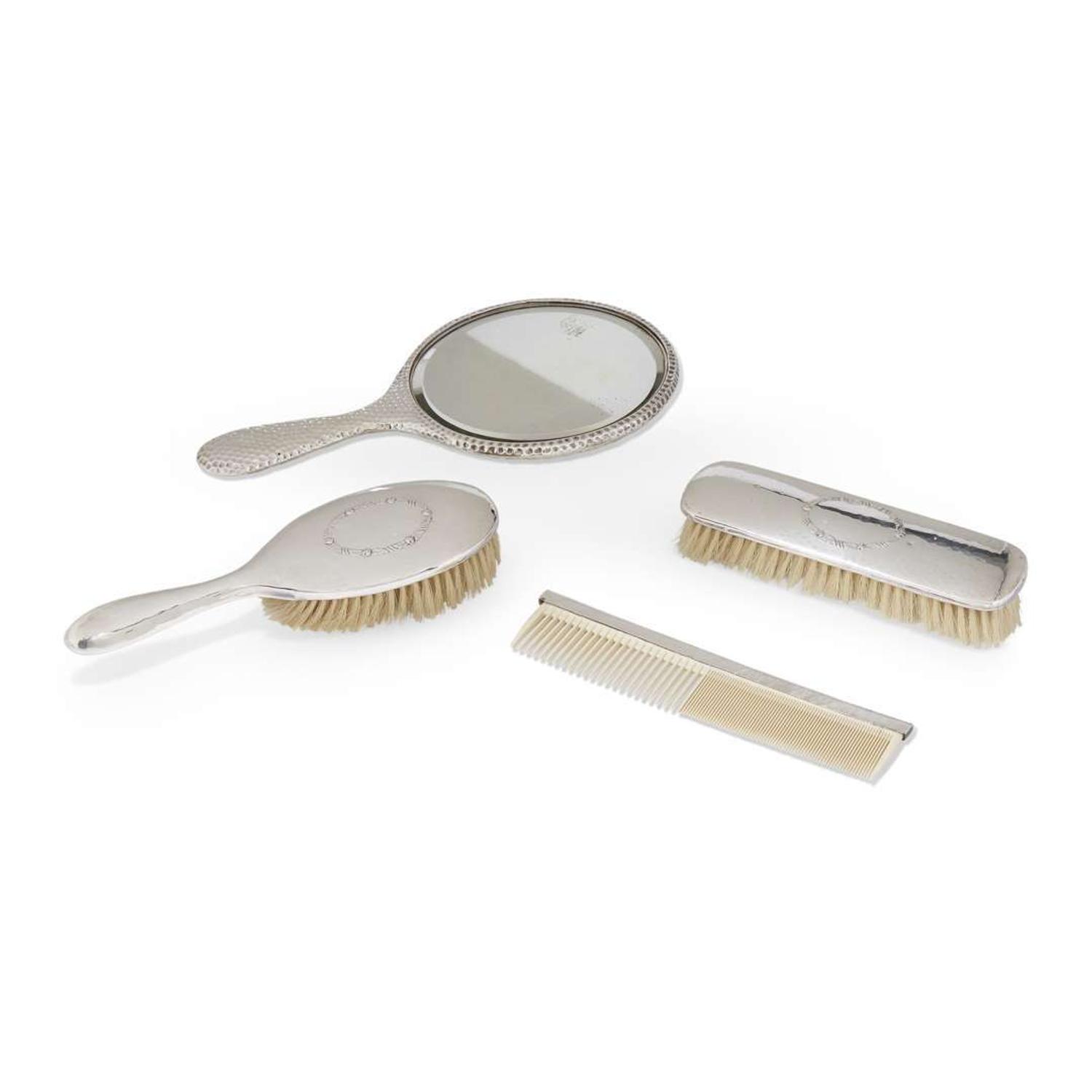 An assembled silver four-piece dressing set various makers, 20th century
