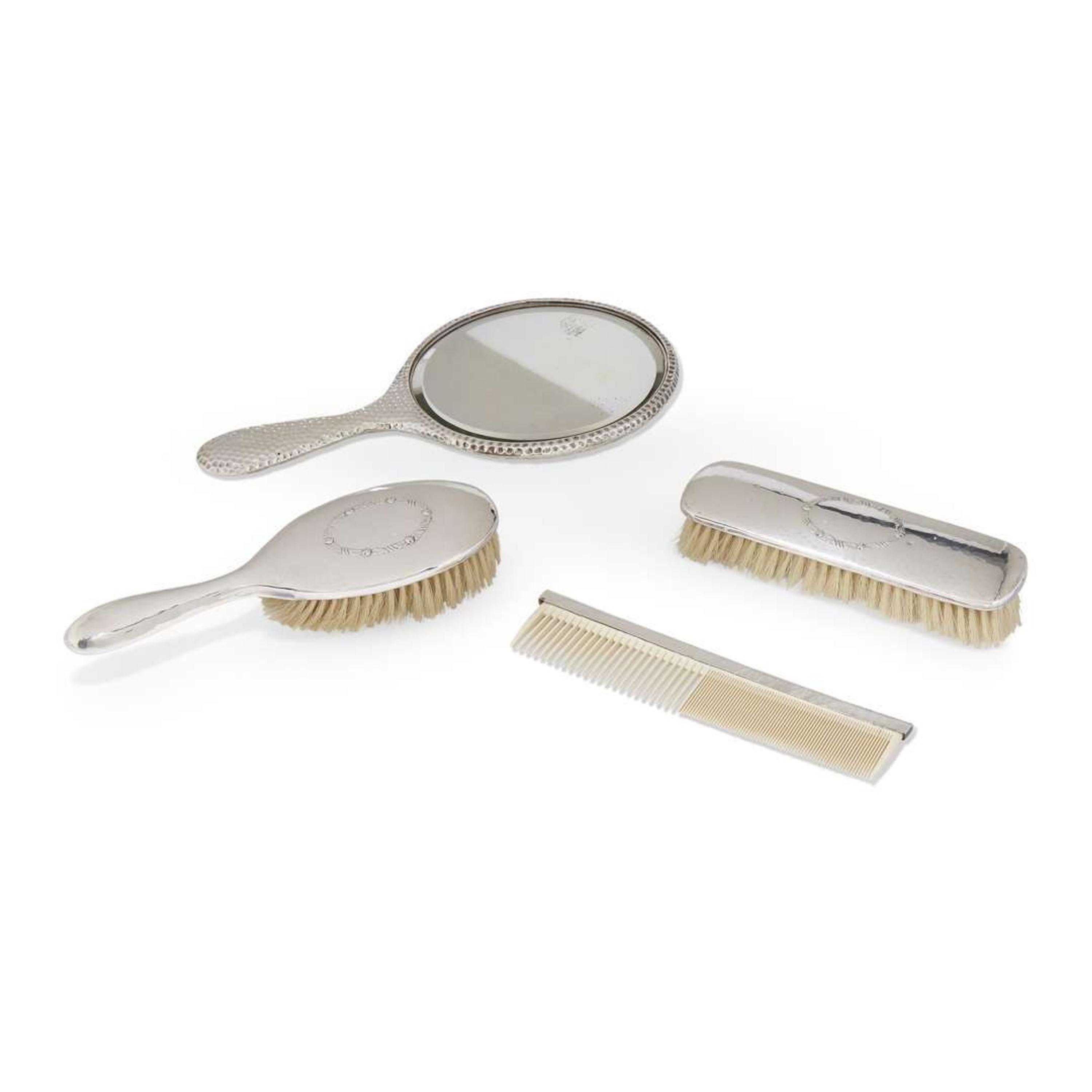 An assembled silver four-piece dressing set various makers, 20th century