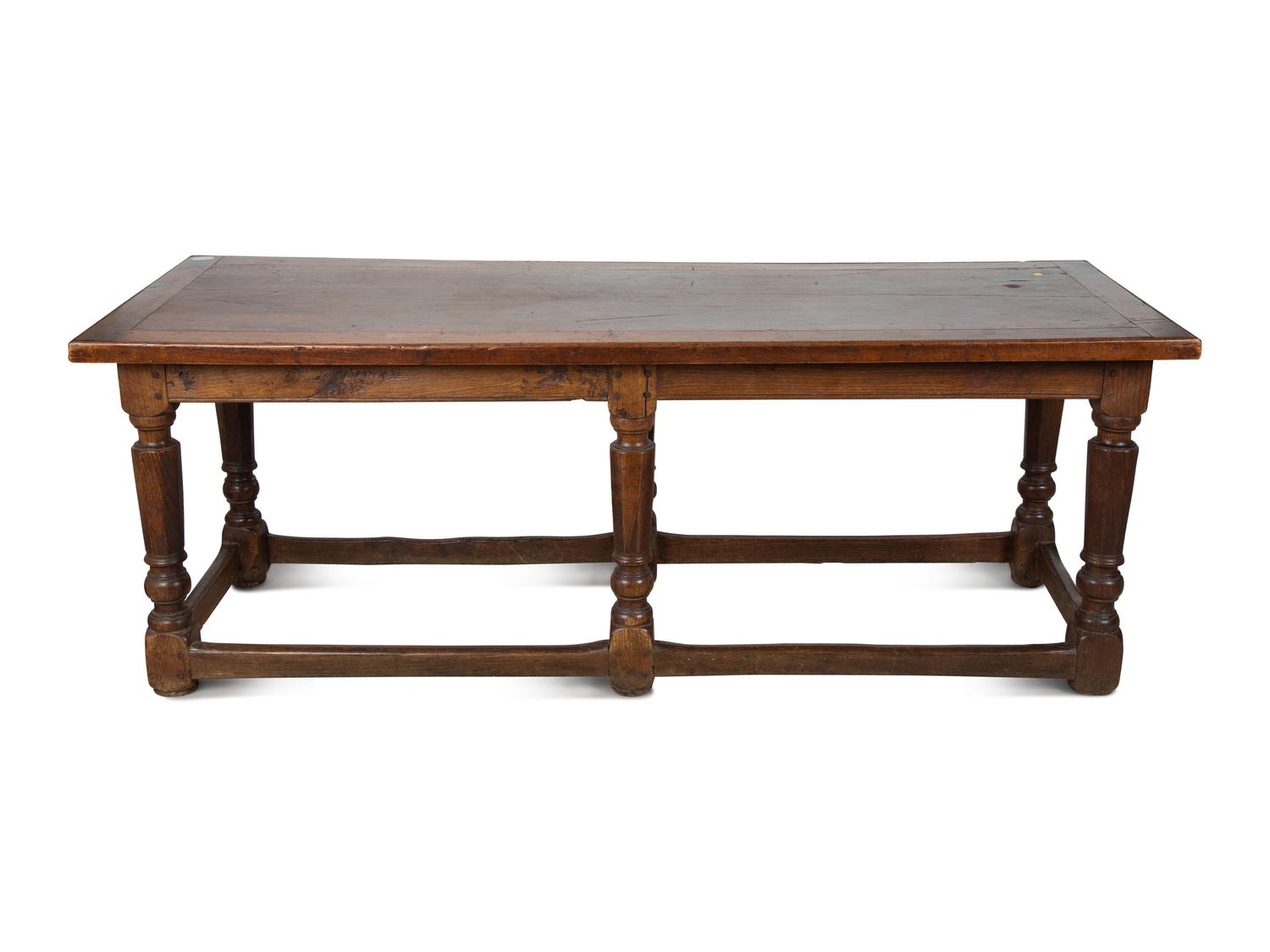 An English Walnut Tavern Table — 18TH CENTURY