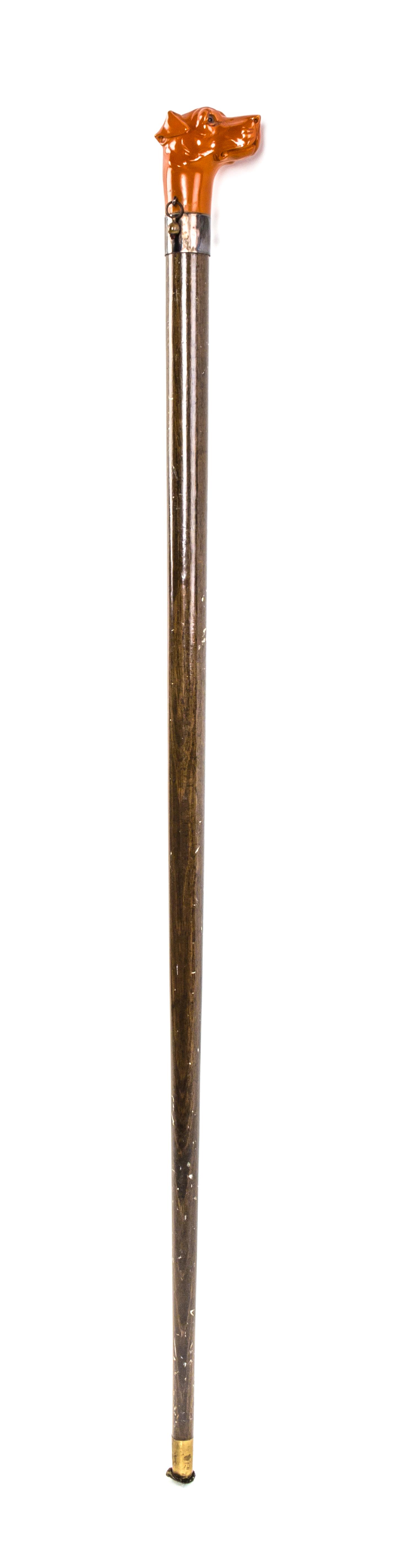 An American Plastic Handled Cane, Length of handle 2 1/4 x length overall 33 1/2 inches.